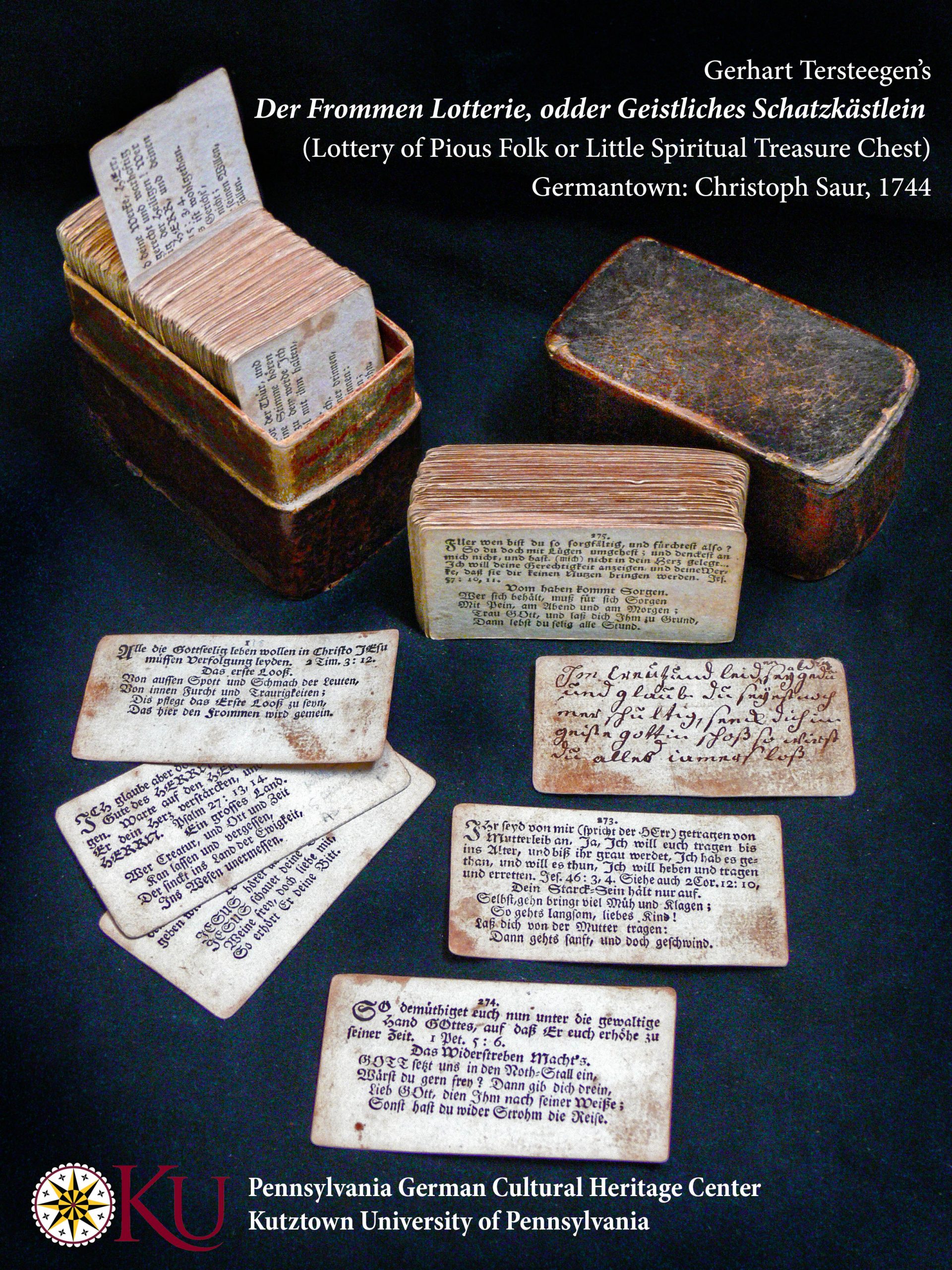 A collection of index-card sized pages and a carrying case are show on a dark blue background. The text on the cards is in printed German script, but some include handwritten notes.
